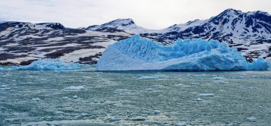 Deep Blue Iceberg, Glacier Ice, Drift floating Ice, Signehamna Harbor, Nordvest-Spitsbergen National Park, Krossfjord, Arctic, Spitsbergen, Svalbard, Norway, Europe clipart