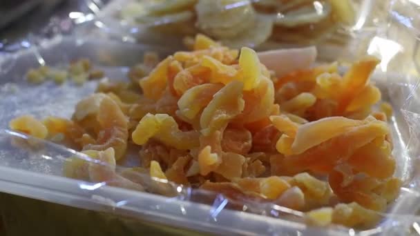 Appetizing Dried Fruit Yellow Sticks Muskmelon White Tray Lie Counter — Video