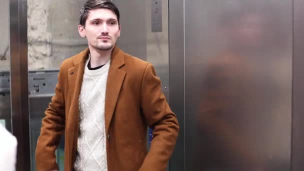 Young Handsome Caucasian Brunette Man Brown Coat Looking Mirror Rises — Vídeos de Stock