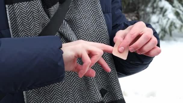 Young Caucasian Man Blue Jacket Scarf Glues Adhesive Plaster His — ストック動画