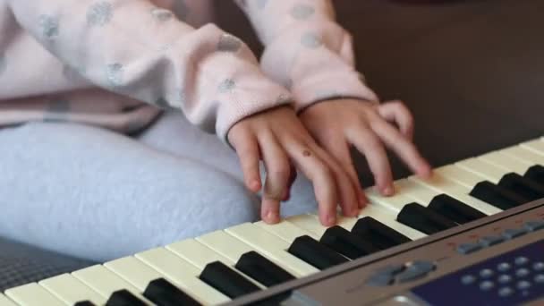 Little Caucasian Girl Unrecognizable Holding Guitar Plucking Strings Her Fingers — Vídeo de Stock
