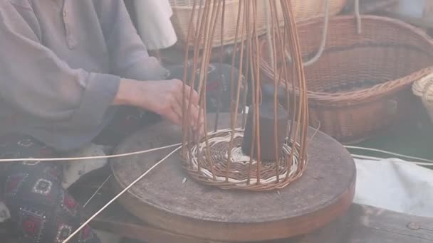 Caucasian Peasant Woman Medieval Era Weaves Basket Twigs Hand Sitting — Vídeos de Stock