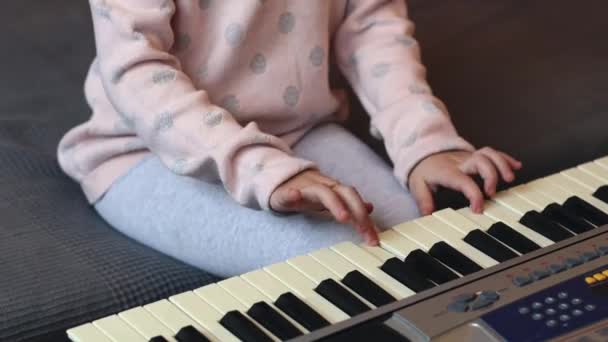 Little Caucasian Girl Unrecognizable Holding Guitar Plucking Strings Her Fingers — Video Stock