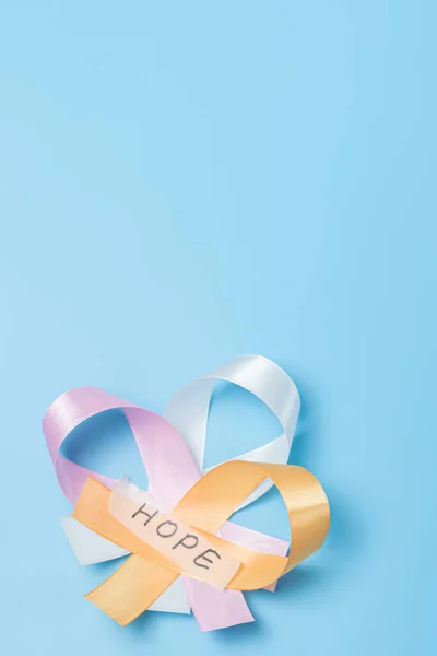 Three Ribbons Pink White Yellow Sticky Tape Word Hope Lie — Stock Photo, Image