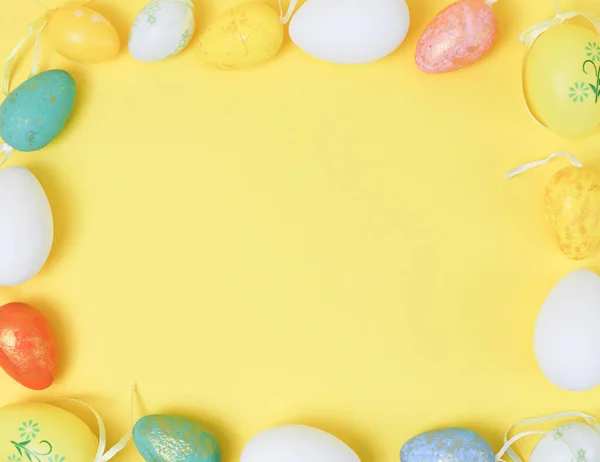 Decorative Easter Eggs Arranged Square Frame Yellow Background Copy Space — Fotografia de Stock