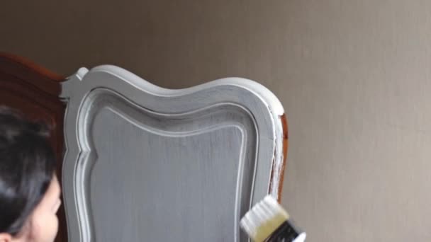 One Young Caucasian Girl Paints Old Brown Headboard Antique Bed — Stock Video