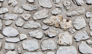 Güneşli bir yaz gününde çimento eklemleri arasında çimento eklemleri olan soyut, doğal bir arka plan manzarası çok güzel. Arkaplan ve dokuları kavra.