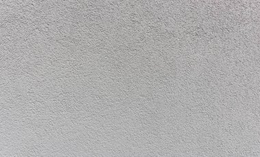 Soyut dokuların güzel yatay görüntüsü, küçük pastel sivilceler, sokak cephesinin koyu gri renkli duvarları, yan görüş genel planı. Güzel arka plan ve dokuları kavra..