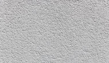 Sivilceli, soyut dokuların güzel yatay görüntüsü ve pastel açık gri renkli duvarlar bina ön cephesi, yan manzara orta plan. Güzel arka plan ve dokuları kavra.