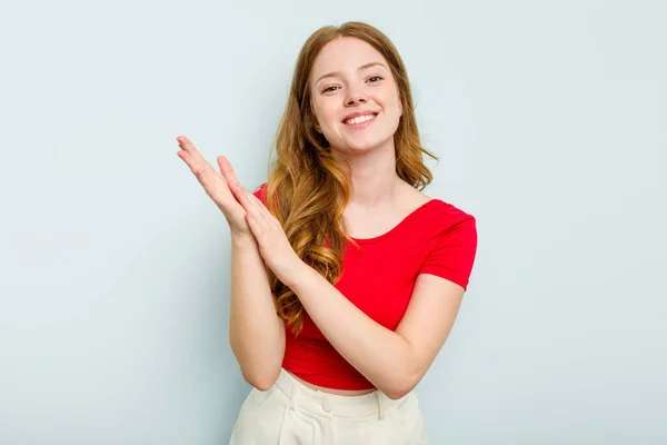 Young Caucasian Woman Isolated Blue Background Feeling Energetic Comfortable Rubbing — Stock Photo, Image