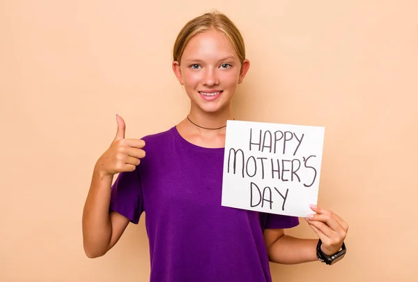 stock image Little caucasian girl holding happy mothers day isolated on beige background