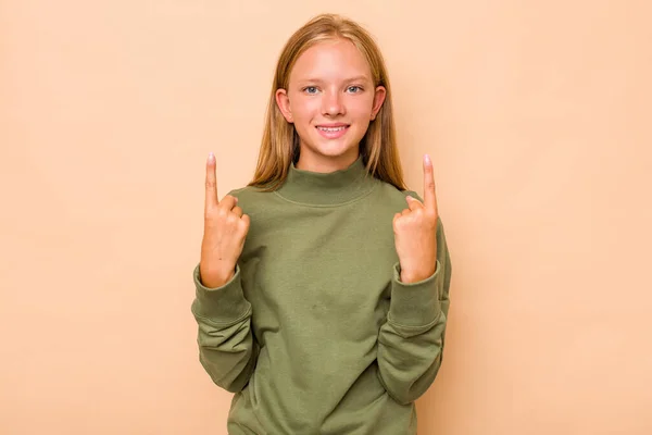 Kavkazský Dospívající Dívka Izolované Béžové Pozadí Indikuje Oběma Předními Prsty — Stock fotografie