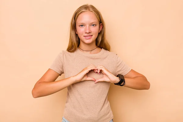 Λευκή Έφηβη Κοπέλα Απομονωμένη Μπεζ Φόντο Χαμογελώντας Και Δείχνοντας Ένα — Φωτογραφία Αρχείου
