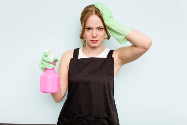 Young Cleaner Woman Isolated Blue Background Being Shocked She Has — Stock Photo, Image