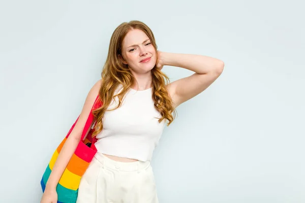 Young Caucasian Woman Holding Lgtbi Bag Isolated Blue Background Touching — Stock Photo, Image