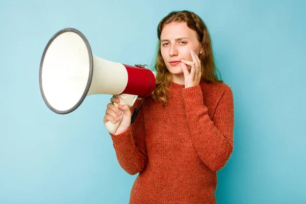Young Caucasian Woman Holding Megaphone Isolated Blue Background Fingers Lips — Stock Photo, Image