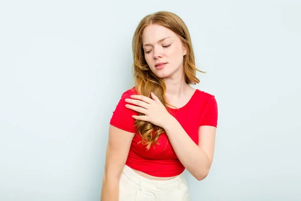 Jonge Blanke Vrouw Geïsoleerd Blauwe Achtergrond Met Een Schouder Pijn — Stockfoto