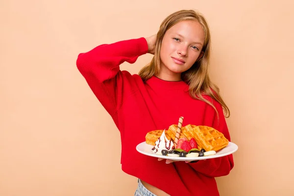 Little Caucasian Girl Holding Waffles Isolated Beige Background Touching Back — Stock Photo, Image