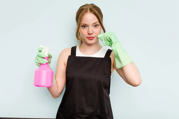 Young Cleaner Woman Isolated Blue Background Fingers Lips Keeping Secret — Stock Photo, Image