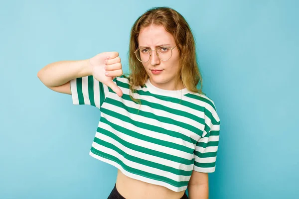 Young Caucasian Woman Isolated Blue Background Showing Thumb Disappointment Concept — Stock Photo, Image
