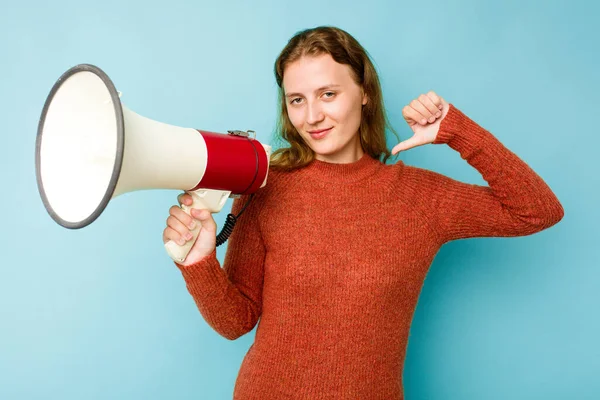 Young Caucasian Woman Holding Megaphone Isolated Blue Background Feels Proud — Stock Photo, Image