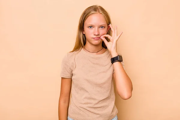 Caucasian Teen Girl Isolated Beige Background Fingers Lips Keeping Secret — Stock Photo, Image