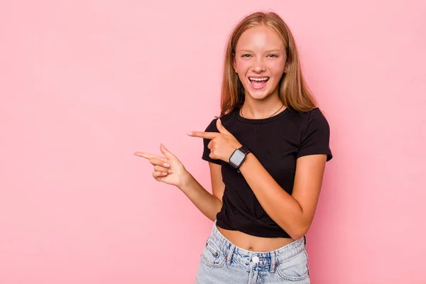 Caucasian Teen Girl Isolated Pink Background Pointing Forefingers Copy Space — Stock Photo, Image