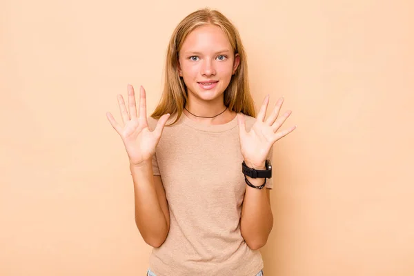 Caucásico Adolescente Chica Aislado Beige Fondo Mostrando Número Diez Con —  Fotos de Stock