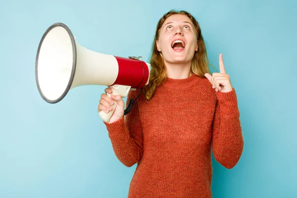 Young Caucasian Woman Holding Megaphone Isolated Blue Background Pointing Upside — Stock Photo, Image