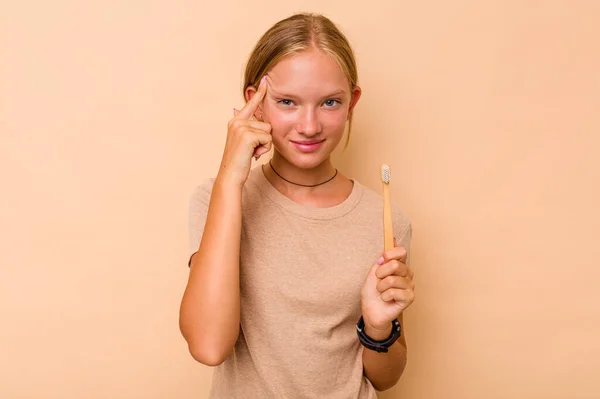 Caucasian Teen Girl Brushing Teeth Isolated Beige Background Showing Disappointment — Stock Photo, Image