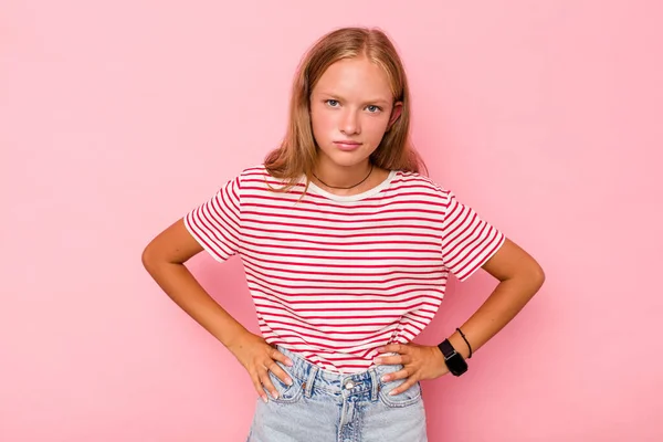 stock image Caucasian teen girl isolated on pink background confused, feels doubtful and unsure.