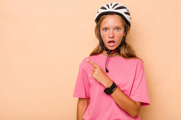 Little Caucasian Girl Wearing Bike Helmet Isolated Beige Background Pointing — Stock Photo, Image