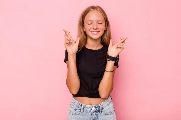 Caucasian Teen Girl Isolated Pink Background Crossing Fingers Having Luck — Stock Photo, Image