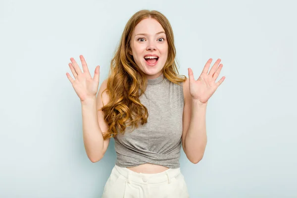Young Caucasian Woman Isolated Blue Background Receiving Pleasant Surprise Excited — Stock Photo, Image