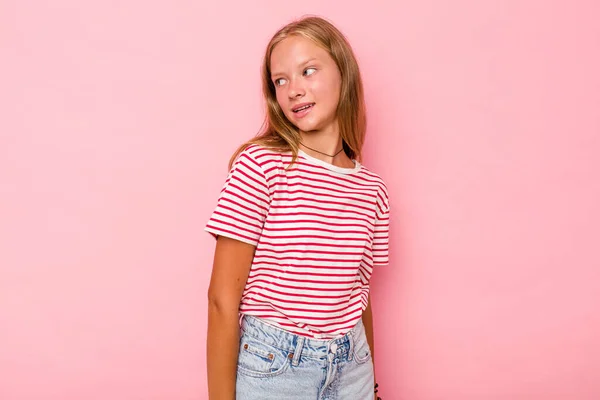 Caucasian Teen Girl Isolated Pink Background Looks Aside Smiling Cheerful — Stock Photo, Image