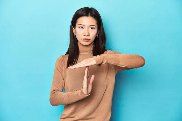 Young Asian Woman Brown Turtleneck Showing Timeout Gesture — Stock Photo, Image