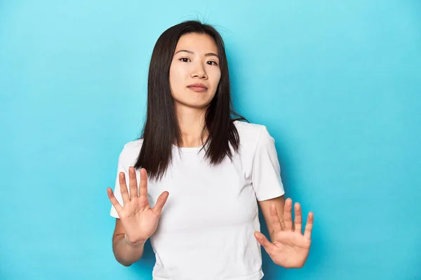 Young Asian Woman White Shirt Studio Shot Rejecting Someone Showing — Stock Photo, Image