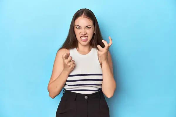 Woman Striped Top Posing Blue Studio Backdrop Upset Screaming Tense — Stock Photo, Image