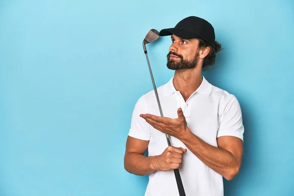 Bearded Long Haired Golfer Holding Golf Club Blue Studio — Stock Photo, Image