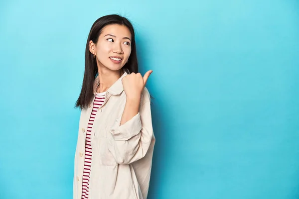 Asian Woman Layered Shirt Striped Shirt Points Thumb Finger Away — Stock Photo, Image