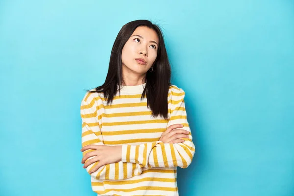 Asian Woman Striped Yellow Sweater Tired Repetitive Task — Stock Photo, Image