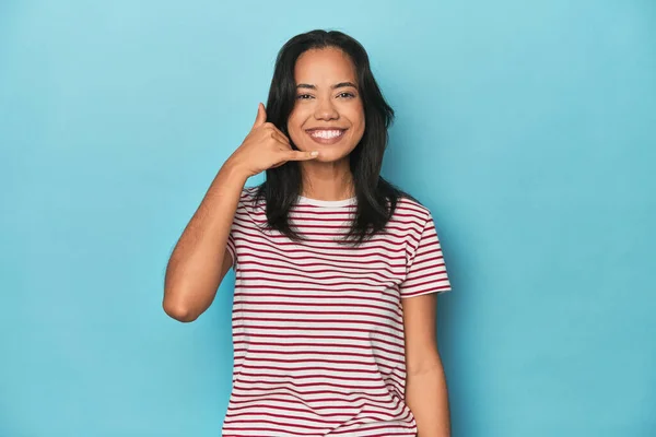 Filipina Young Woman Blue Studio Showing Mobile Phone Call Gesture — Stock Photo, Image