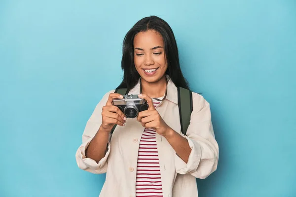 Young Filipina Capturing Moments Camera Blue Studio Backdrop — Stock Photo, Image