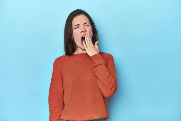 Young Caucasian Woman Blue Backdrop Yawning Showing Tired Gesture Covering — Stock Photo, Image