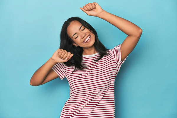 Filipina Young Woman Blue Studio Celebrating Special Day Jumps Raise — Stock Photo, Image