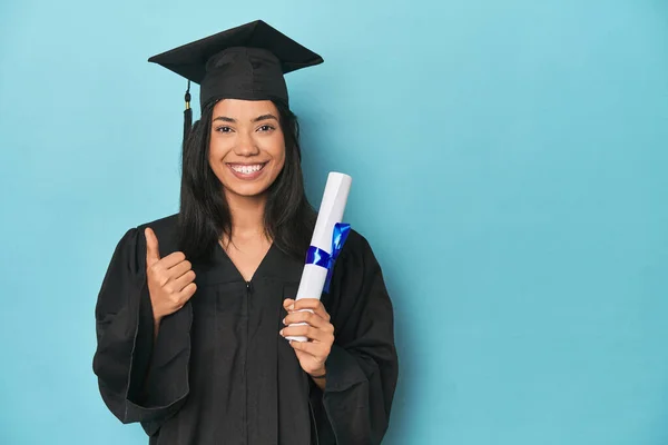 Filipina Graduate Diploma Blue Studio Smiling Raising Thumb — Stock Photo, Image