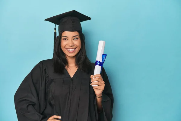Filipina Graduate Diploma Blue Studio Showing Copy Space Palm Holding — Stock Photo, Image