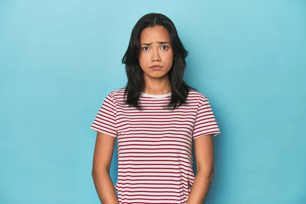 Filipina Young Woman Blue Studio Sad Serious Face Feeling Miserable — Stock Photo, Image