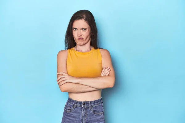 Young Caucasian Woman Blue Backdrop Frowning Face Displeasure Keeps Arms — Stock Photo, Image