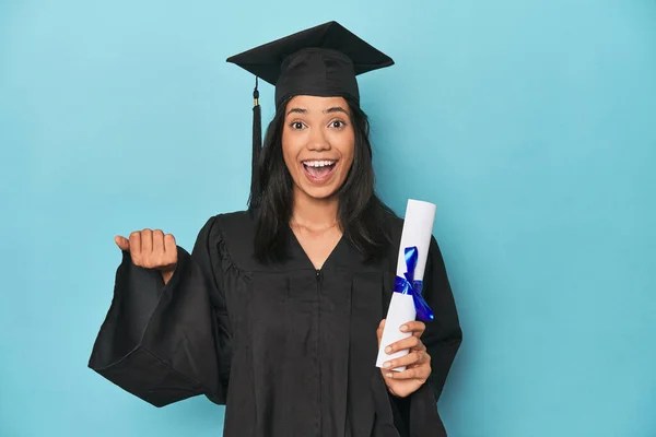 Celebrating Filipina Graduate Diploma Cap Blue Studio — Stock Photo, Image